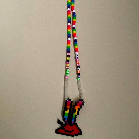 “Are you feeling it Mr Krabs” Mr Krabs Kandi Rave Necklace UV Sun Reactive - Picture 1 of 3